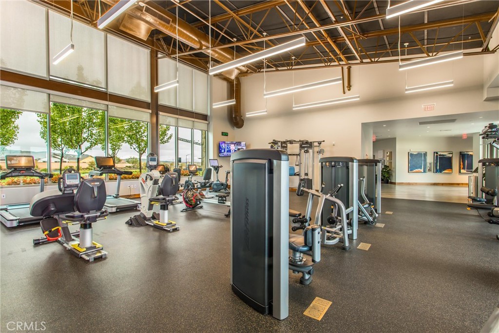 1685 Spring Run Lane Beaumont, CA 92223 - Photo 45 of 57 a view of a room with gym equipment