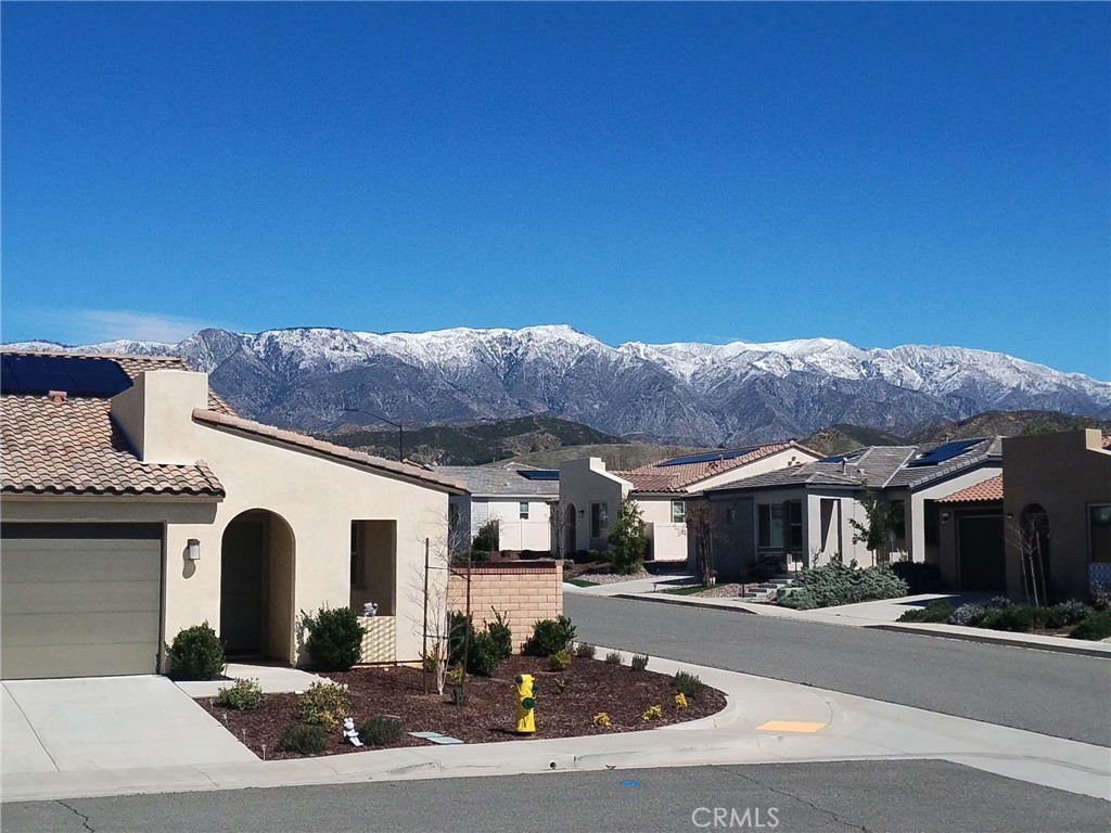 1685 Spring Run Lane Beaumont, CA 92223 - Photo 57 of 57 a front view of a house with a yard