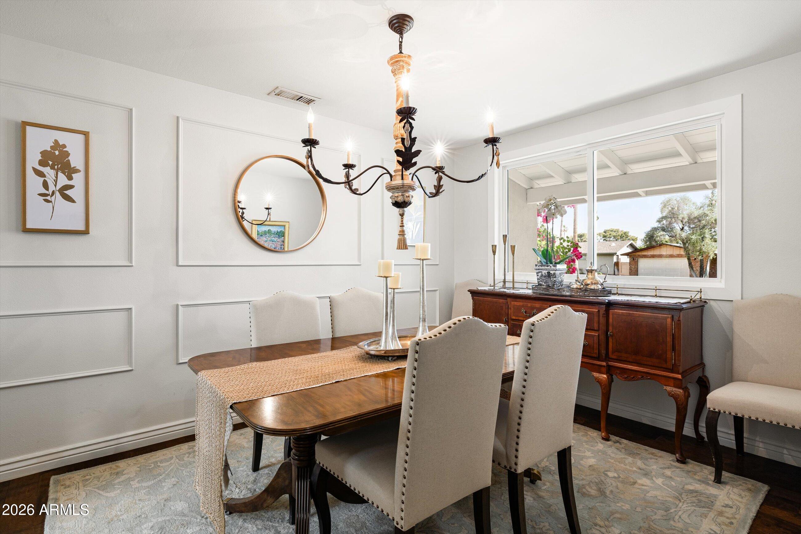 7142 North 14th Street Phoenix, AZ 85020 - Photo 12 of 29 a view of a dining room with furniture