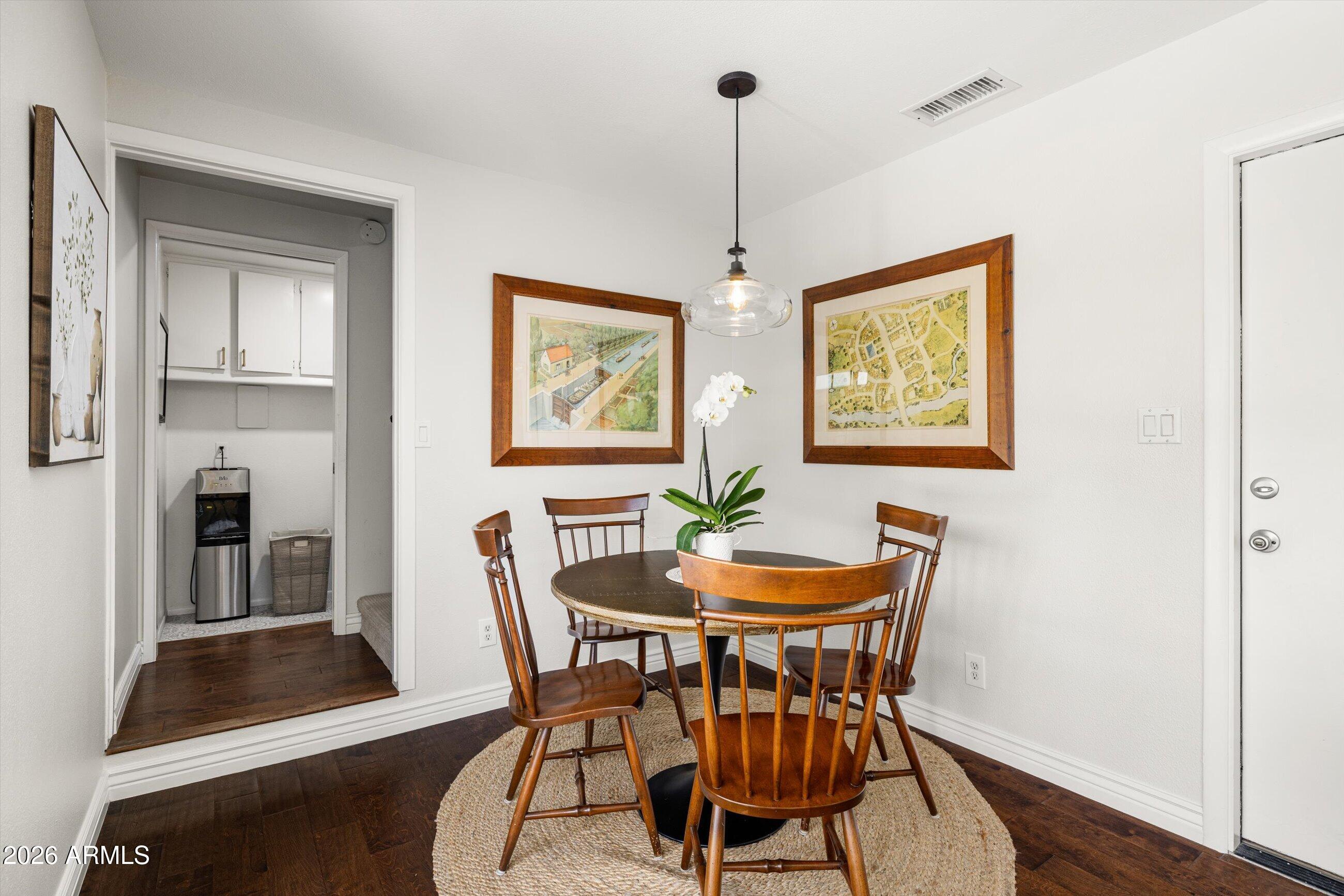7142 North 14th Street Phoenix, AZ 85020 - Photo 13 of 29 a dining room with furniture and window