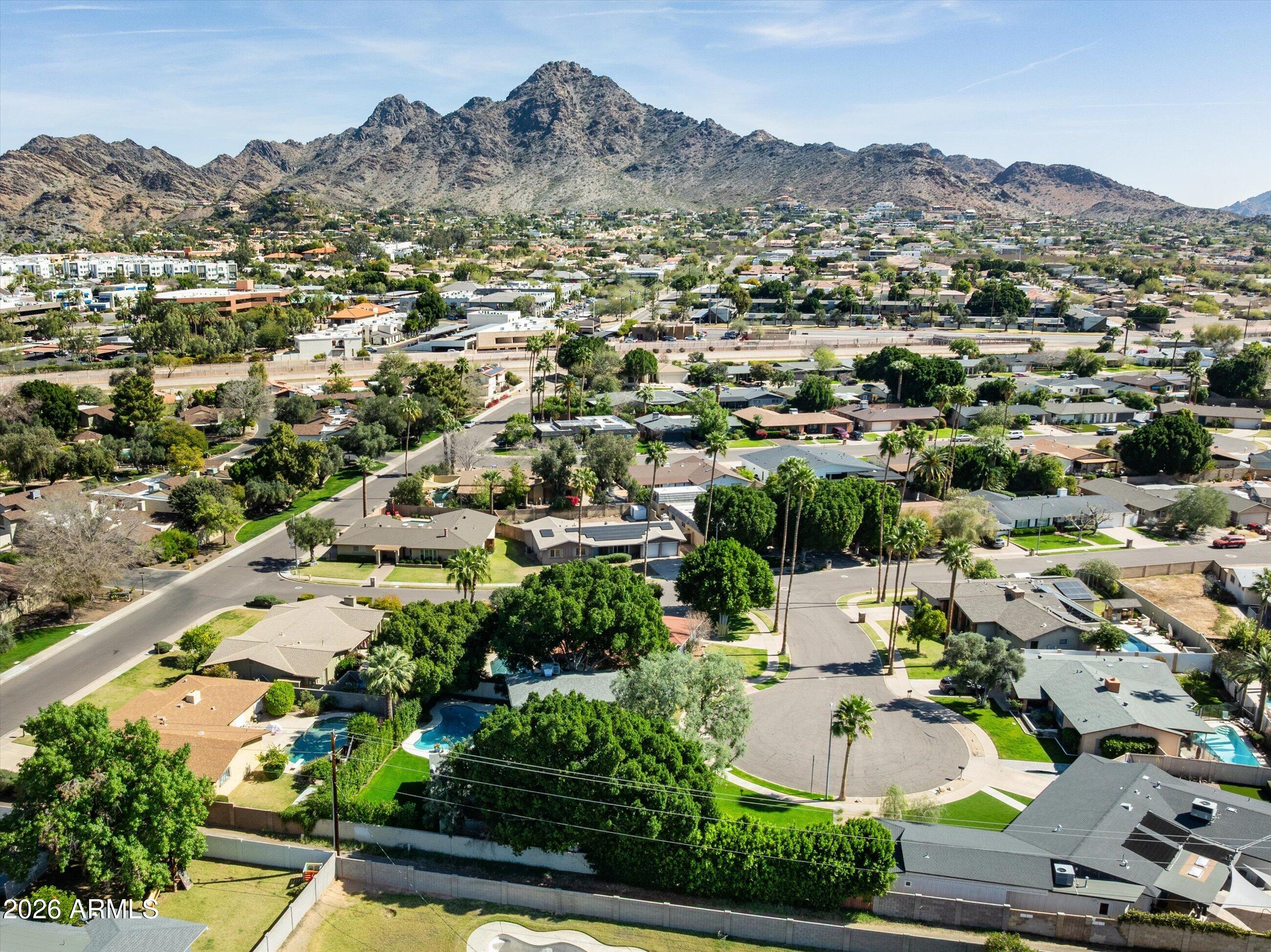 7142 North 14th Street Phoenix, AZ 85020 - Photo 27 of 29 an aerial view of residential houses with outdoor space and trees