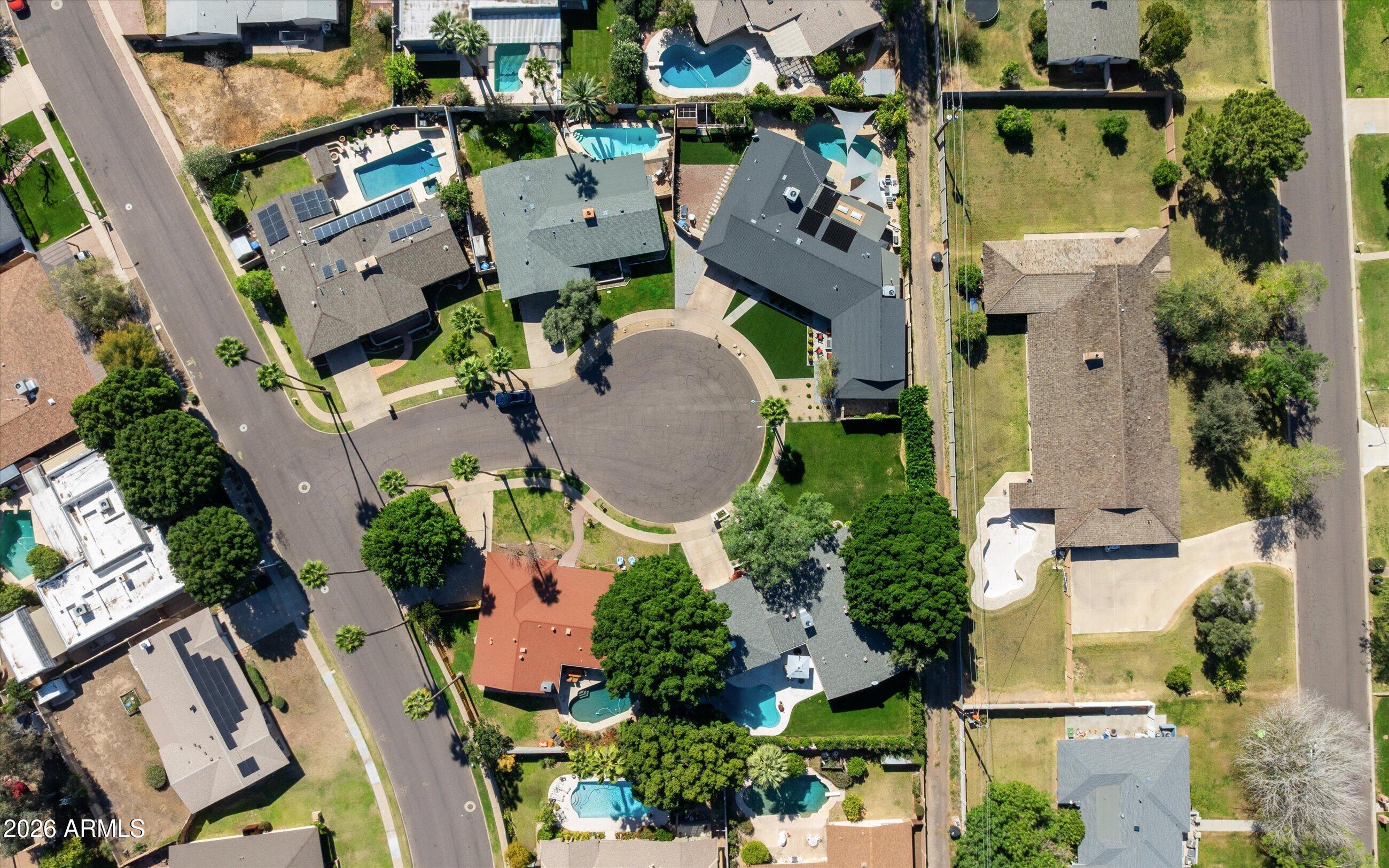 7142 North 14th Street Phoenix, AZ 85020 - Photo 29 of 29 an aerial view of multiple houses with yard
