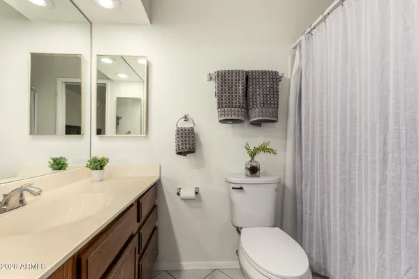 a view of a storage & utility room with a sink