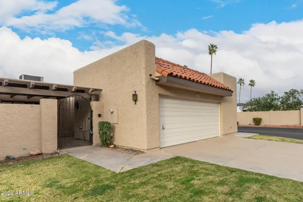 a front view of a house with a garage