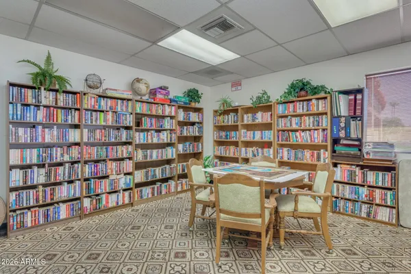 a dining room with a table and chairs