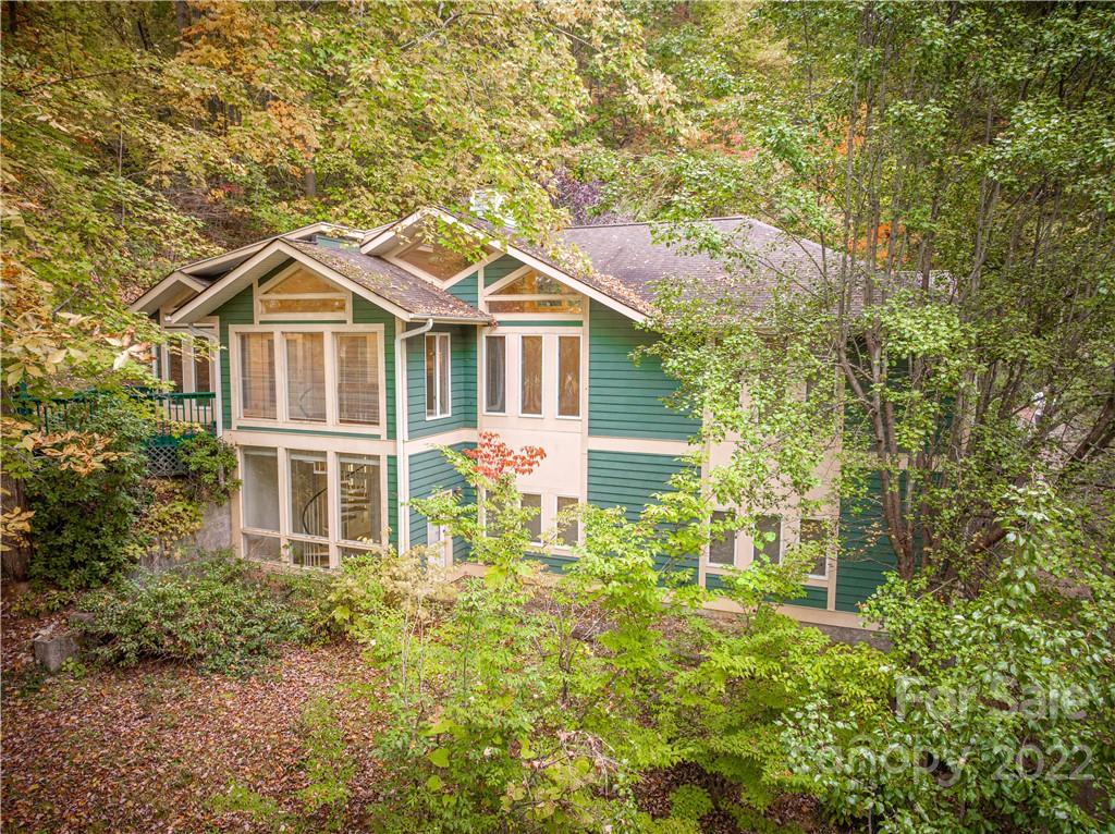 592 Mouzon Road Waynesville, NC 28785 - Photo 1 of 38 front view of a house with a yard