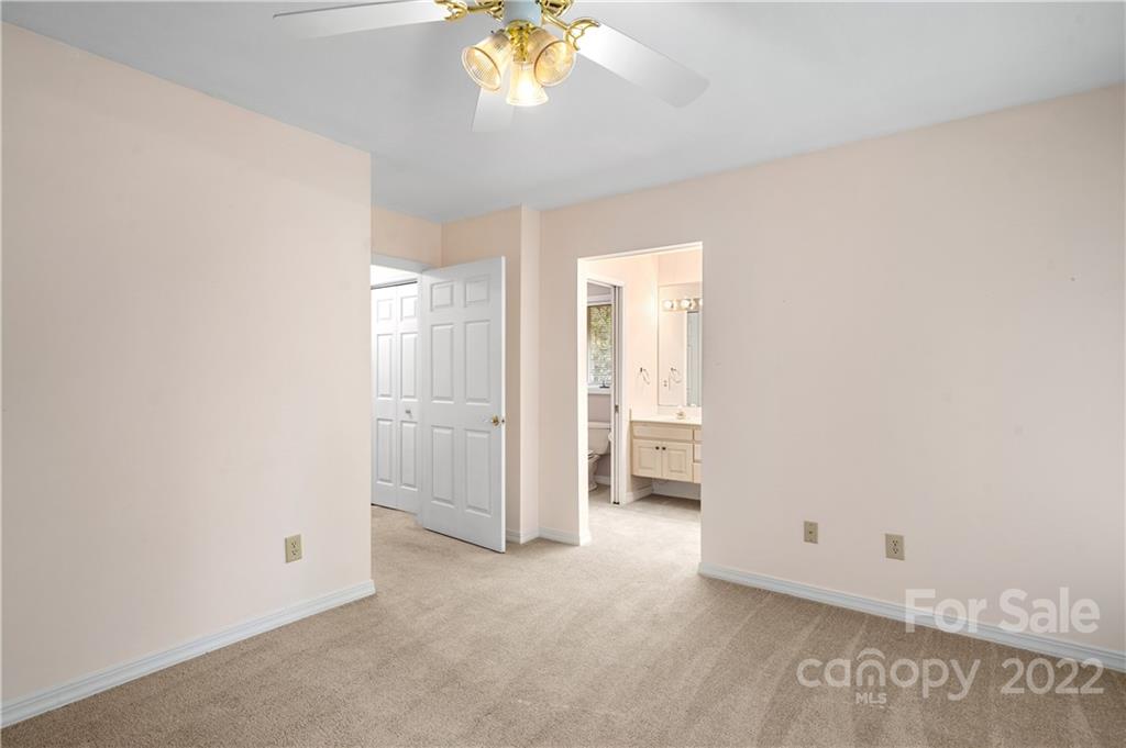 592 Mouzon Road Waynesville, NC 28785 - Photo 12 of 38 a view of an empty room and a bathroom