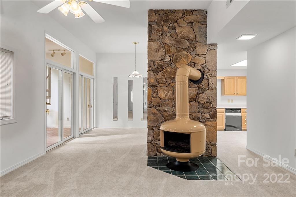 592 Mouzon Road Waynesville, NC 28785 - Photo 24 of 38 an entryway with a table and chairs