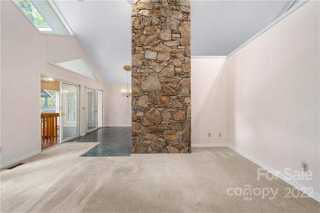592 Mouzon Road Waynesville, NC 28785 - Photo 3 of 38 en empty room with windows
