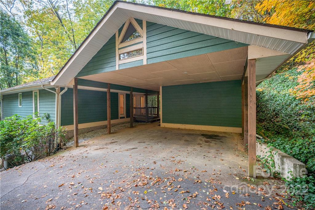 592 Mouzon Road Waynesville, NC 28785 - Photo 35 of 38 a view of a house with a yard