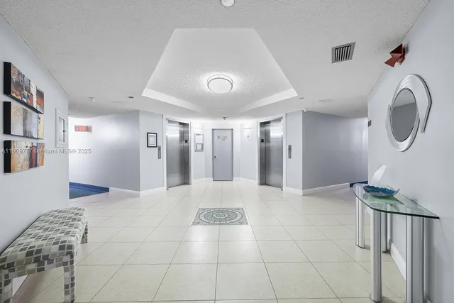 a view of livingroom with furniture and front door
