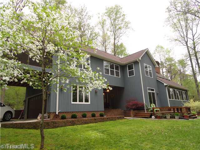 8102 Hunting Cog Road Oak Ridge, NC 27310 - Photo 1 of 16 Exterior Front.