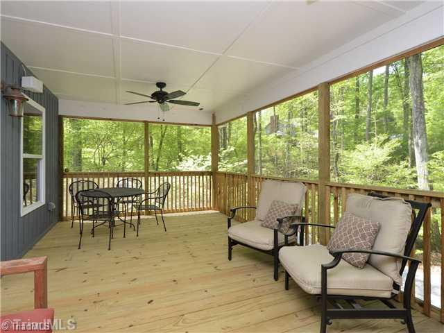 8102 Hunting Cog Road Oak Ridge, NC 27310 - Photo 12 of 16 Screened Porch.