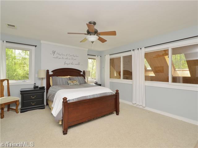 8102 Hunting Cog Road Oak Ridge, NC 27310 - Photo 9 of 16 Master Bedroom.