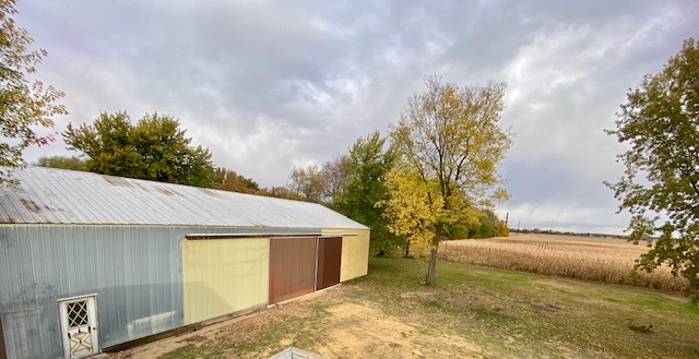 926 McCoy Road Amboy, IL 61310 - Photo 22 of 25 a view of backyard with green space