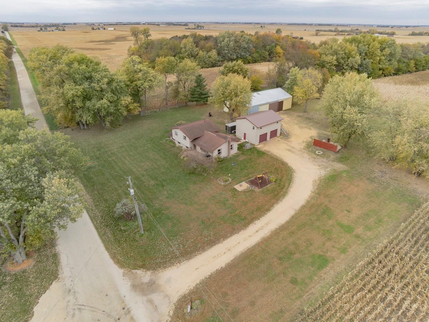 926 McCoy Road Amboy, IL 61310 - Photo 4 of 25 a view of a lake in middle of the town