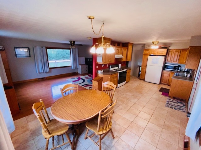 926 McCoy Road Amboy, IL 61310 - Photo 9 of 25 a dining room with furniture and window