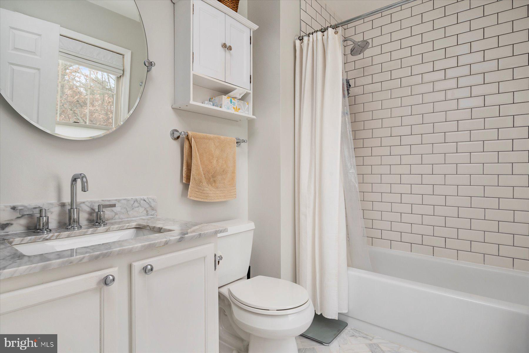 304 Pytchley Run Annapolis, MD 21403 - Photo 18 of 41 Primary Bathroom Carrara Marble & Subway Tile