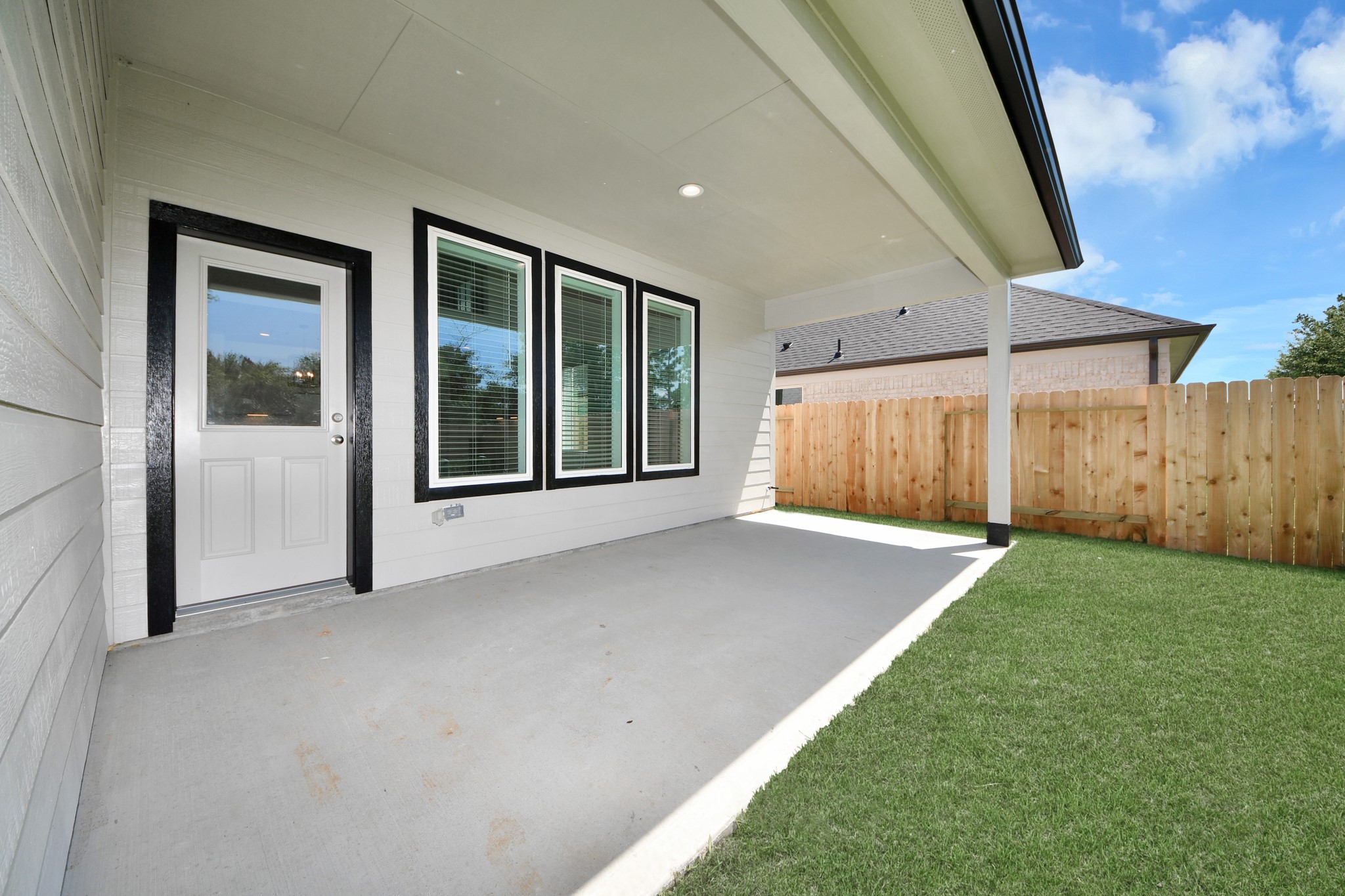 2926 Bury Park Dr Spring Spring, TX 77373 - Photo 37 of 40 Experience outdoor living at its finest on this expansive covered patio, thoughtfully designed for BBQs and delightful outdoor dining.