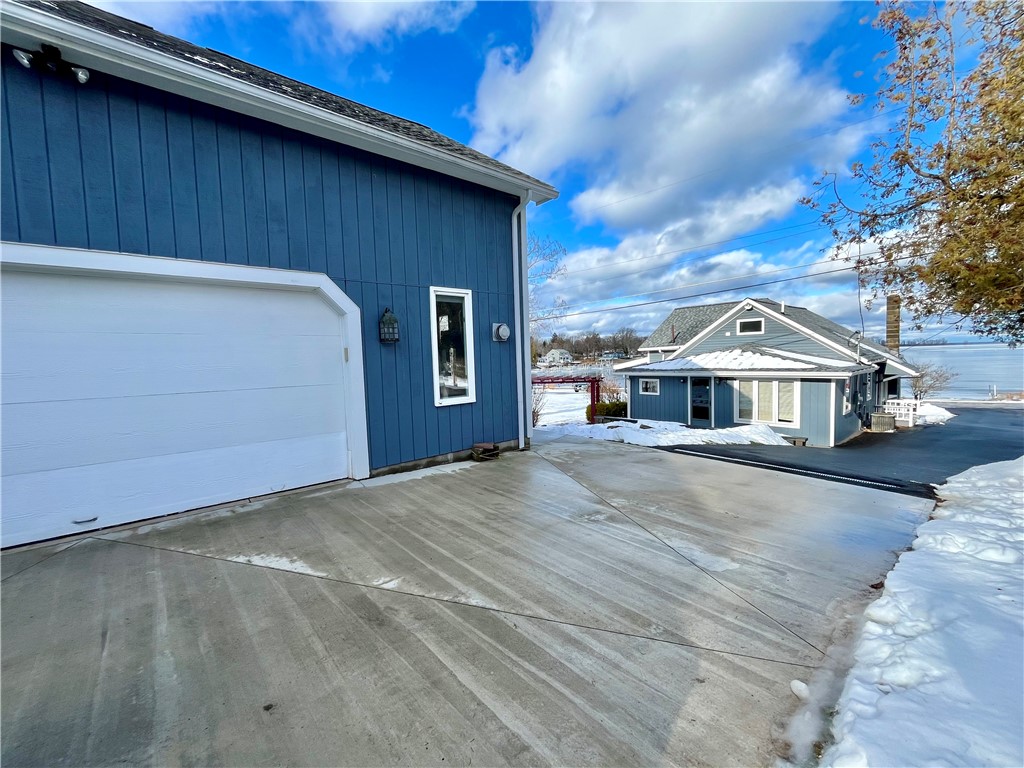 11604 Tompkins Point Road Huron, NY 14590 - Photo 37 of 50 Concrete driveway for the garage and pole barn