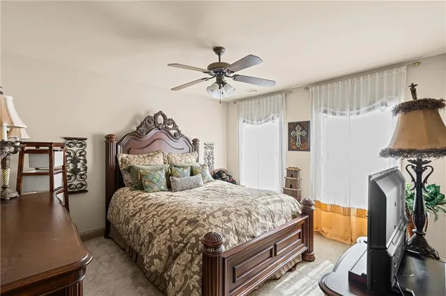 a sign that is sitting in front of flowers