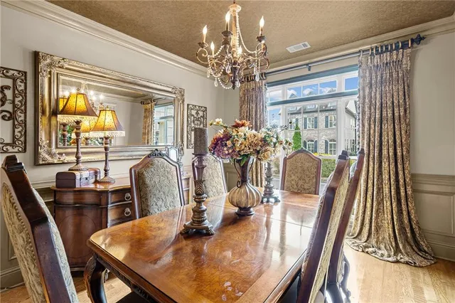 a living room with furniture flat screen tv and a fireplace