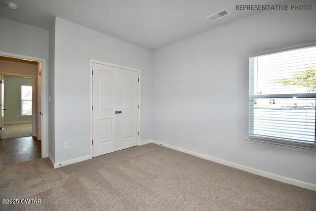 an empty room with a window