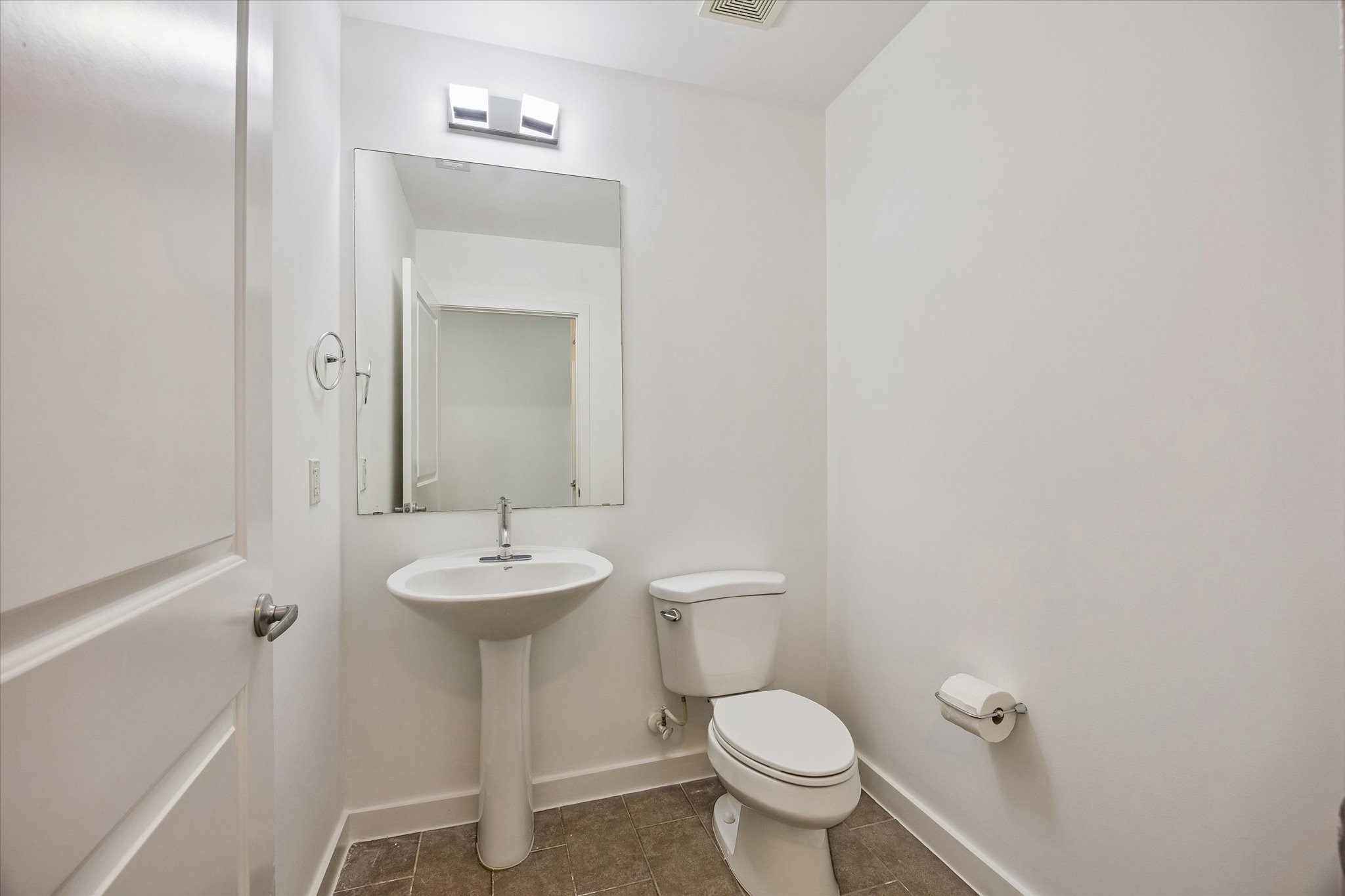5925 Almeda Road, Unit 11615 Houston, TX 77004 - Photo 11 of 23 No need for guests to use your bathroom, there is a half bath located off the entry