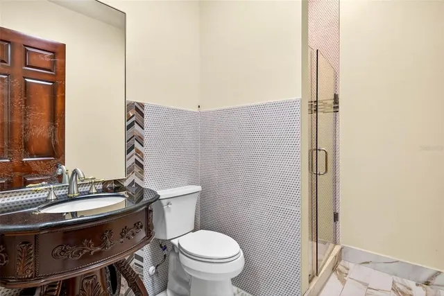 a view of a swimming pool with an outdoor space and seating area