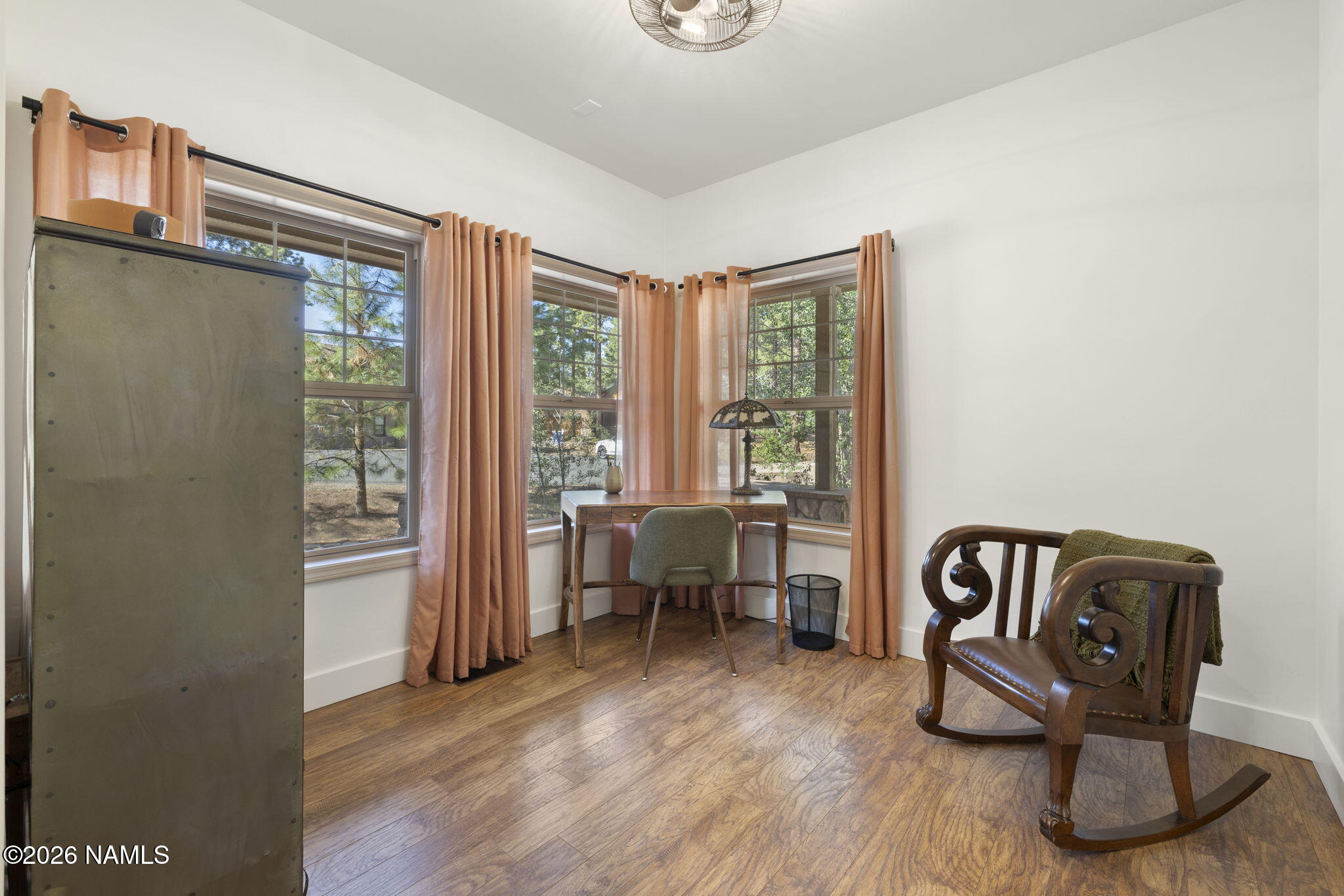 3495 West Lead Rope Flagstaff, AZ 86005 - Photo 11 of 49 a living room with furniture and a window