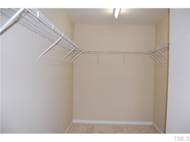 117 Steam Engine Way Garner, NC 27529 - Photo 12 of 21 Oversized walk-in closet in master bedroom.