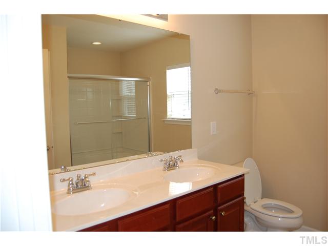 117 Steam Engine Way Garner, NC 27529 - Photo 13 of 21 Master bathroom with raised height dual vanity.
