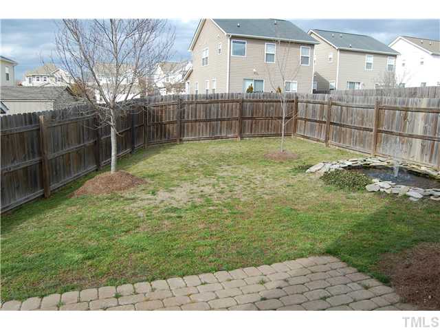 117 Steam Engine Way Garner, NC 27529 - Photo 20 of 21 View of fenced-in backyard from kitchen.