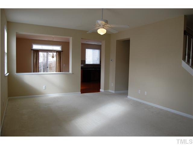 117 Steam Engine Way Garner, NC 27529 - Photo 3 of 21 Enter into nice foyer with hardwood flooring, then enjoy a large living space with open view of spacious kitchen. Ceiling fan, neutral paint & blinds throughout home included!
