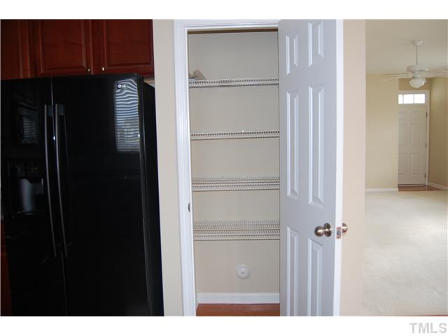 117 Steam Engine Way Garner, NC 27529 - Photo 7 of 21 Kitchen pantry with shelving. Great for kitchen storage in addition to the ample cabinet space!