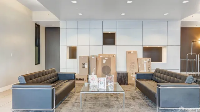 a bedroom with a bed and a table in it