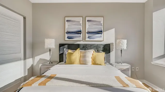 a bathroom with a granite countertop sink a toilet and a bathtub