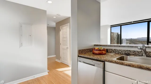 a view of steet with a glass door