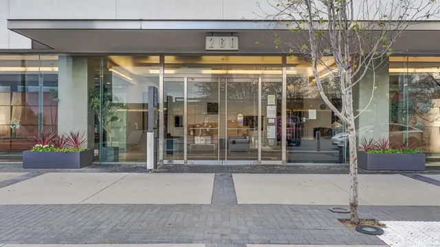 a front view of a building with glass windows