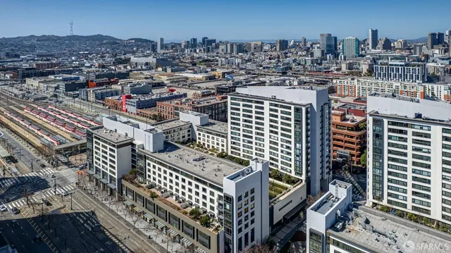 a group of people sitting on a street