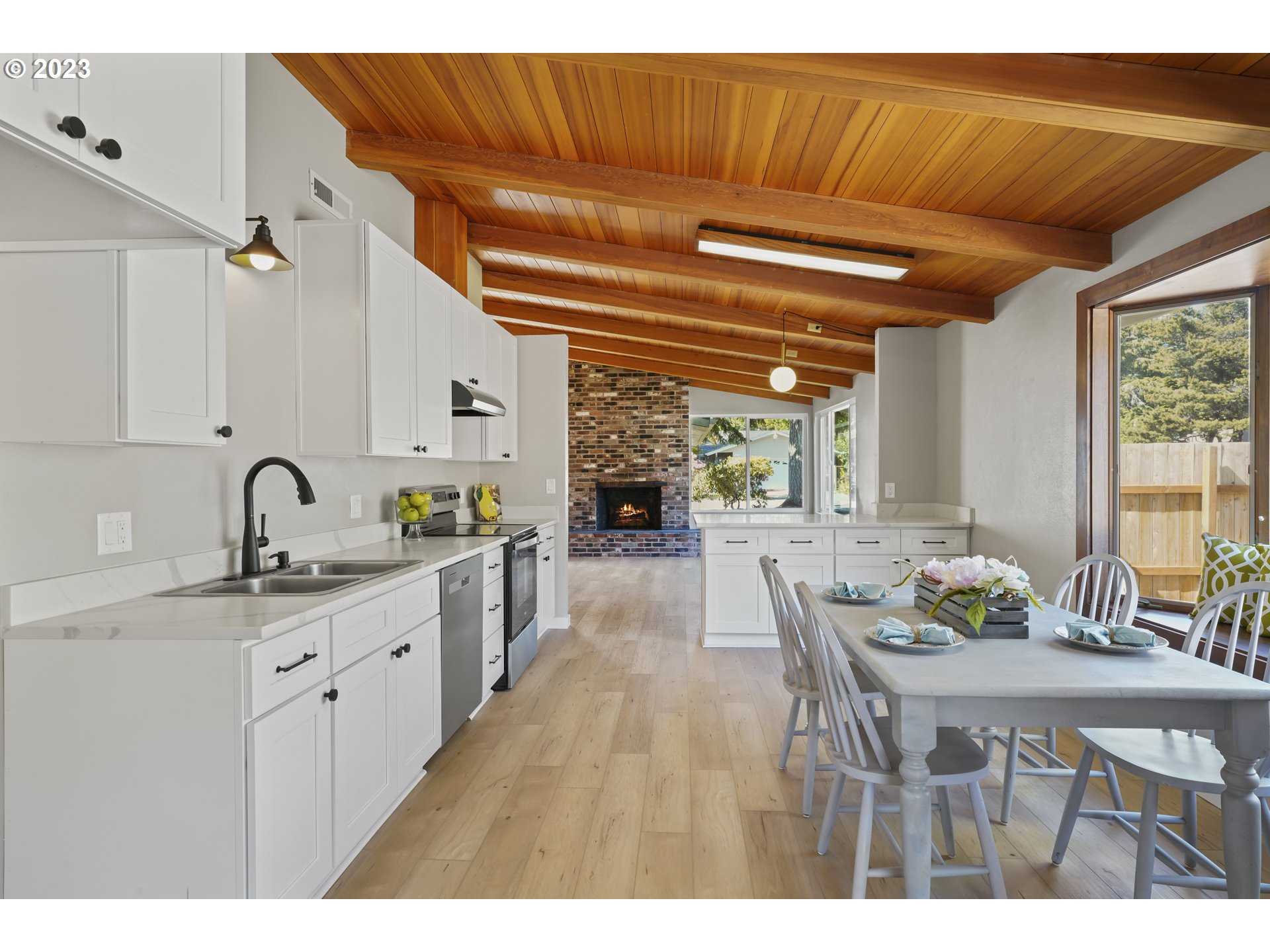 2232 24th Street Florence, OR 97439 - Photo 16 of 38 a open kitchen with sink and cabinets