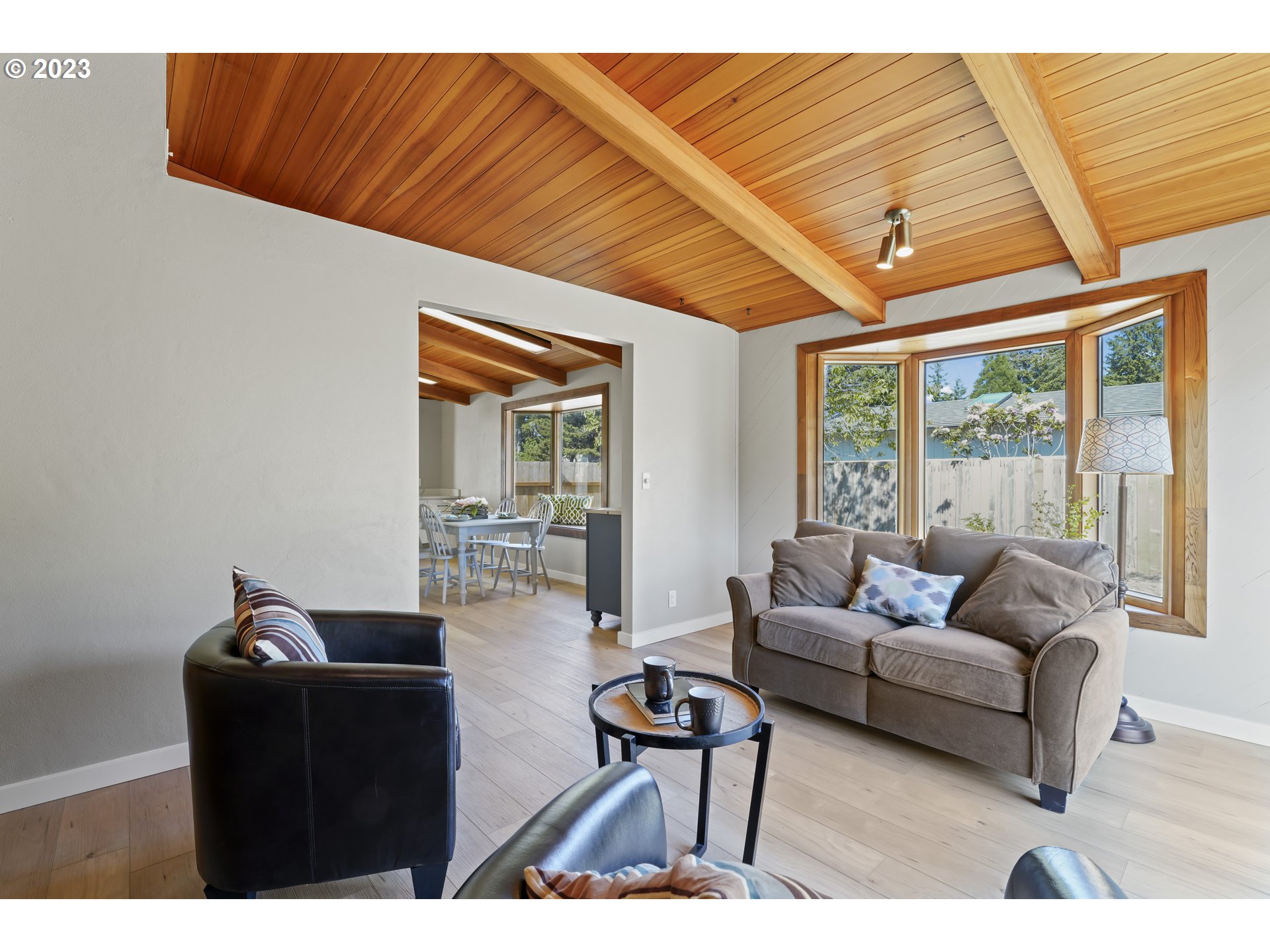 2232 24th Street Florence, OR 97439 - Photo 19 of 38 a living room with furniture and a large window
