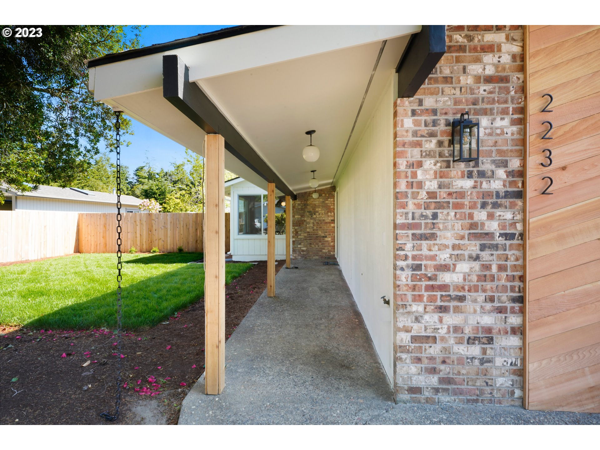 2232 24th Street Florence, OR 97439 - Photo 2 of 38 a view of a backyard