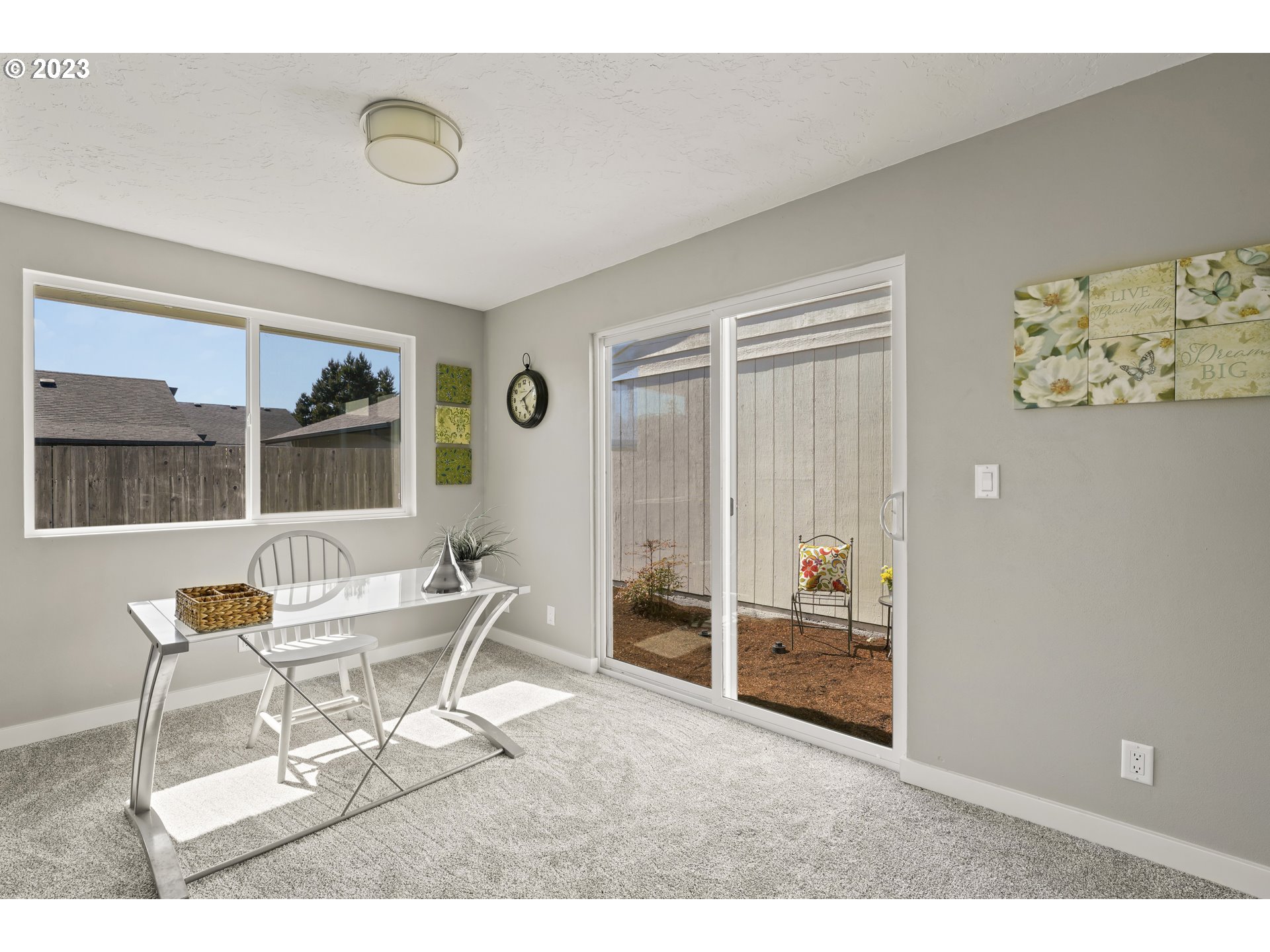 2232 24th Street Florence, OR 97439 - Photo 21 of 38 a living room with furniture and a large window