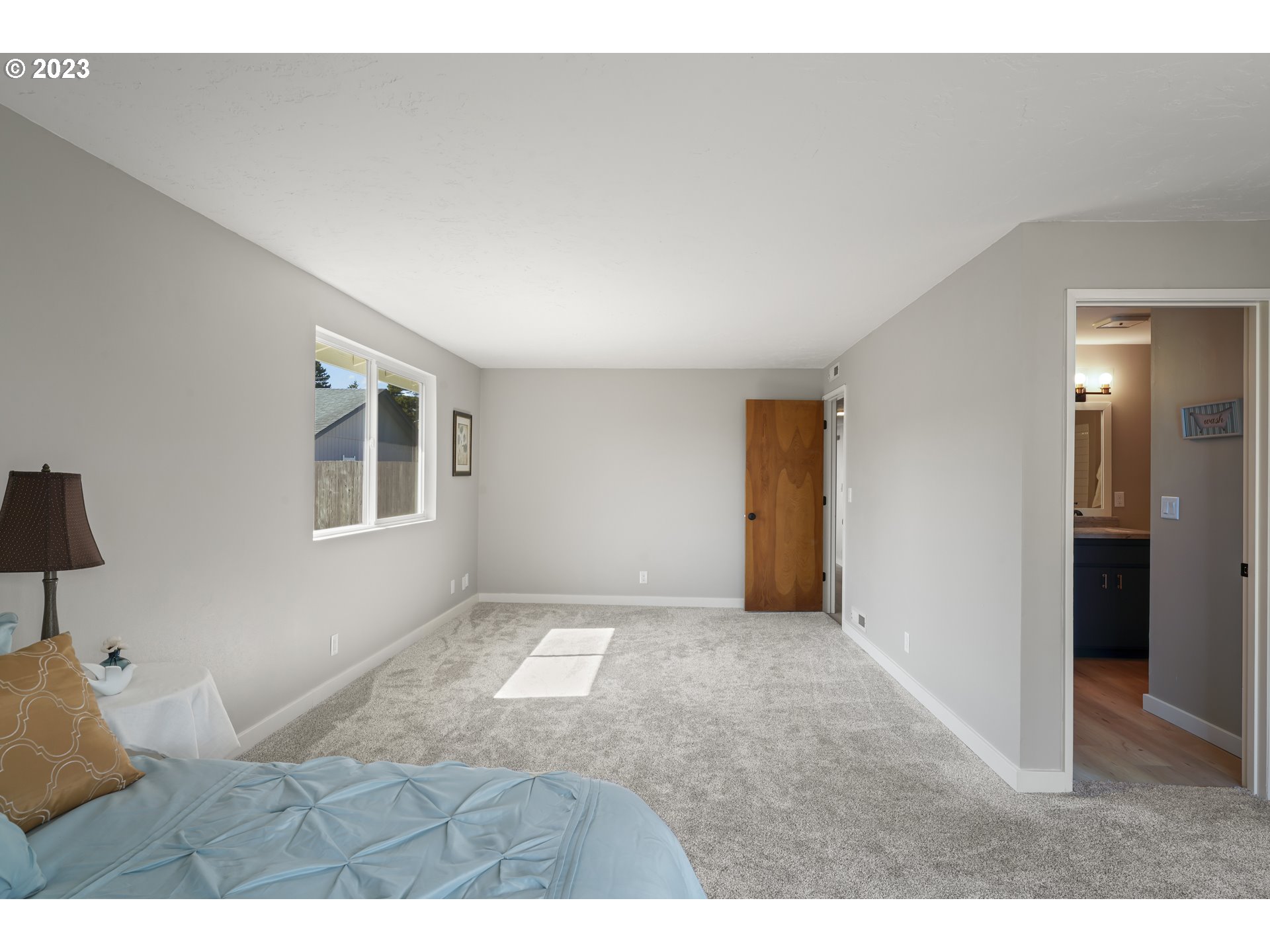 2232 24th Street Florence, OR 97439 - Photo 31 of 38 a view of empty room with wooden floor