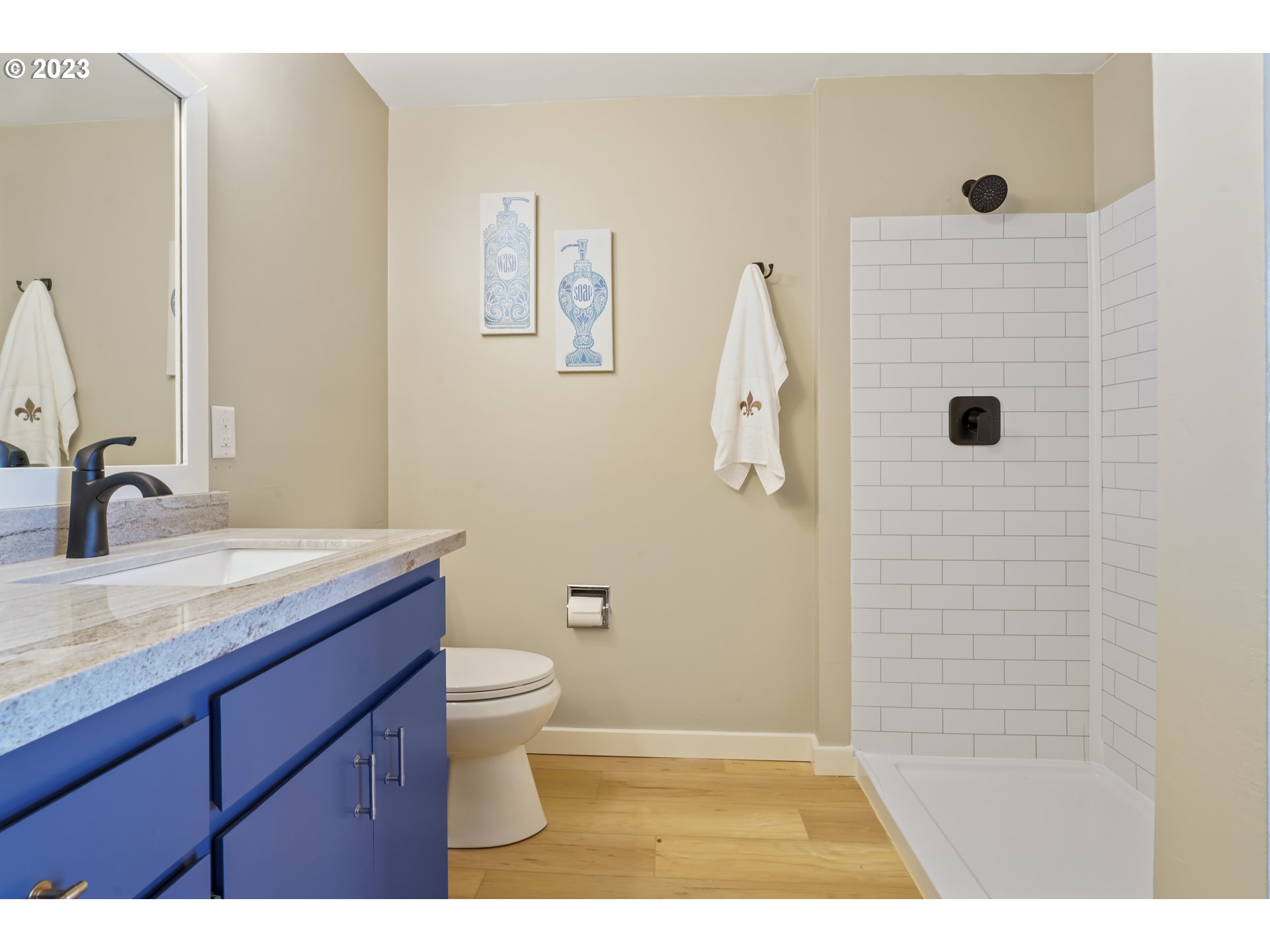 2232 24th Street Florence, OR 97439 - Photo 33 of 38 a bathroom with a sink a toilet and shower