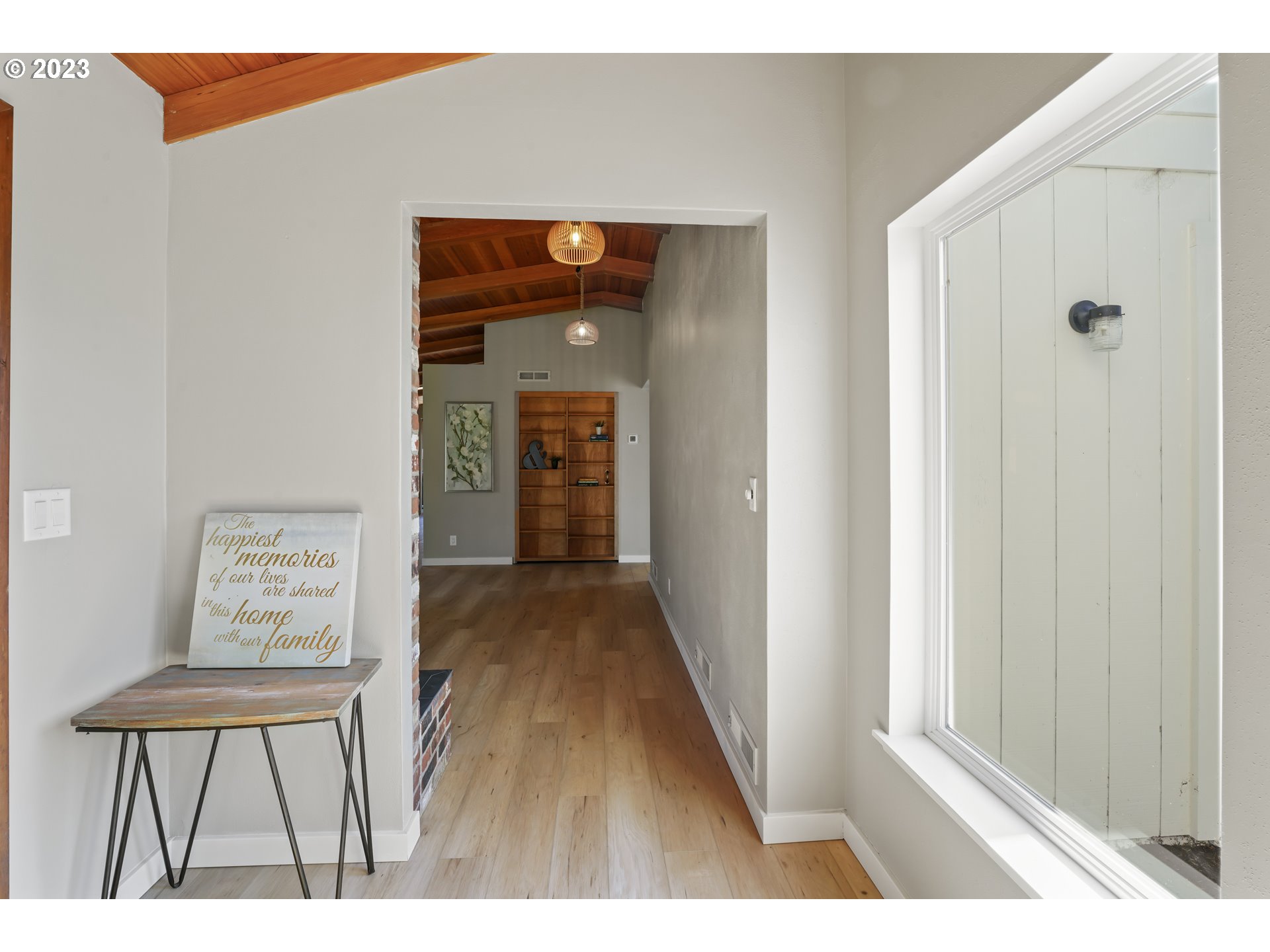 2232 24th Street Florence, OR 97439 - Photo 7 of 38 a view of a hallway to a livingroom with furniture