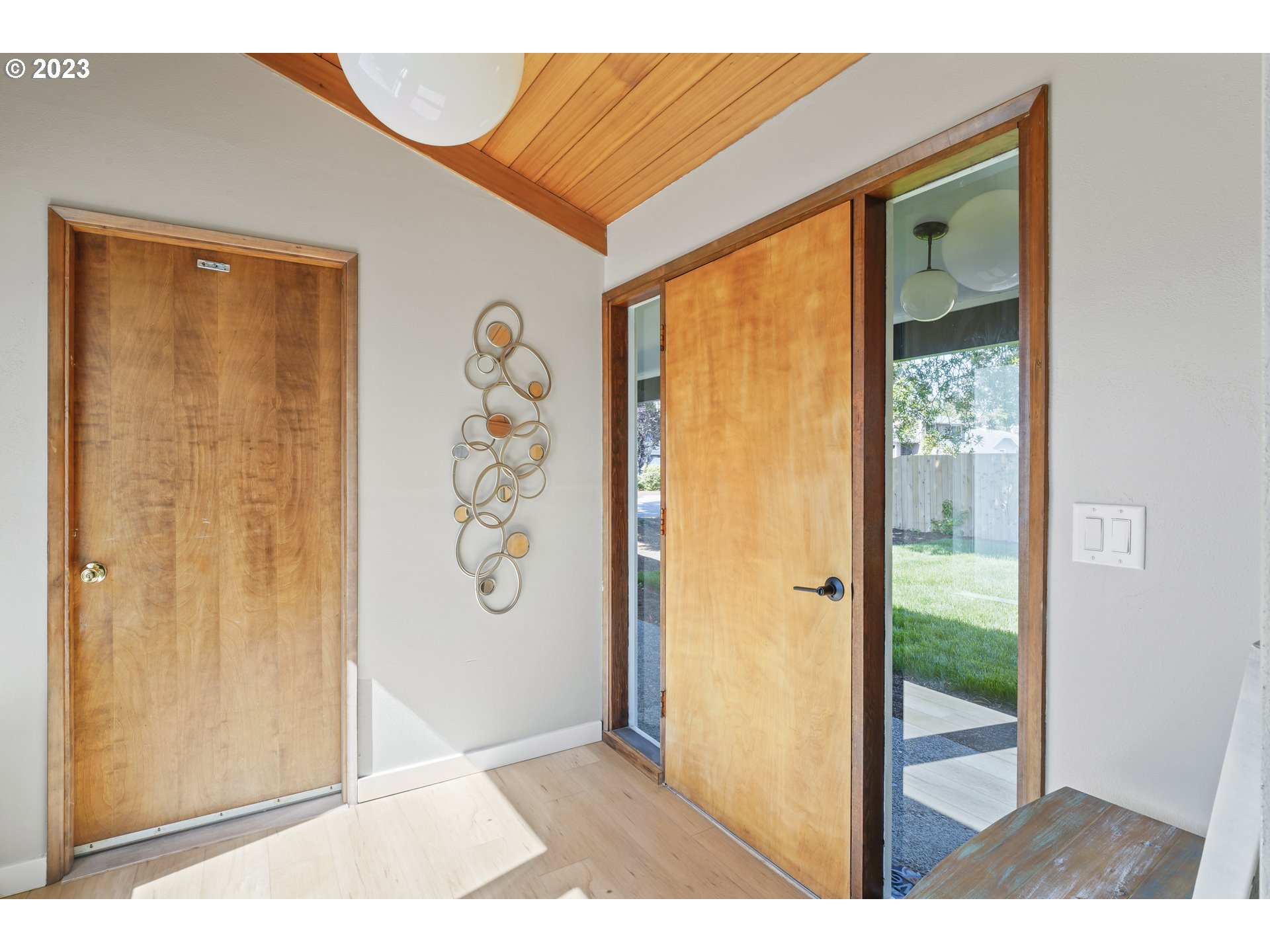 2232 24th Street Florence, OR 97439 - Photo 8 of 38 a view of a livingroom with wooden floor and a window