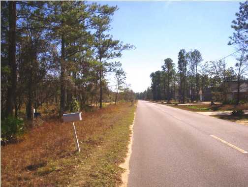 Lot 9 Bay Grove Road Freeport, FL 32439 - Photo 4 of 6 a view of swimming pool with a yard
