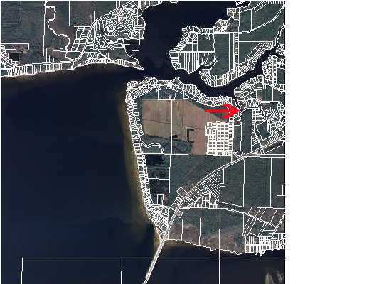 Lot 9 Bay Grove Road Freeport, FL 32439 - Photo 6 of 6 a picture of a bathroom with a glass door